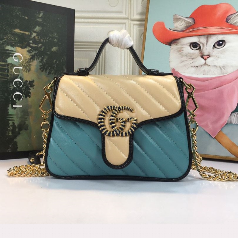 G*u*i top handle bags